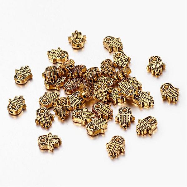 

PandaHall Tibetan Style Alloy Hamsa Hand/Hand of Fatima/Hand of Miriam Beads, Cadmium Free & Lead Free, Antique Golden, 12x10x4mm, Hole...