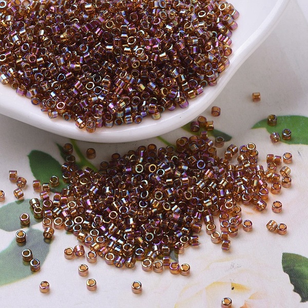 

PandaHall MIYUKI Delica Beads, Cylinder, Japanese Seed Beads, 11/0, (DB0170) Transparent Topaz AB, 1.3x1.6mm, Hole: 0.8mm, about..., Brown