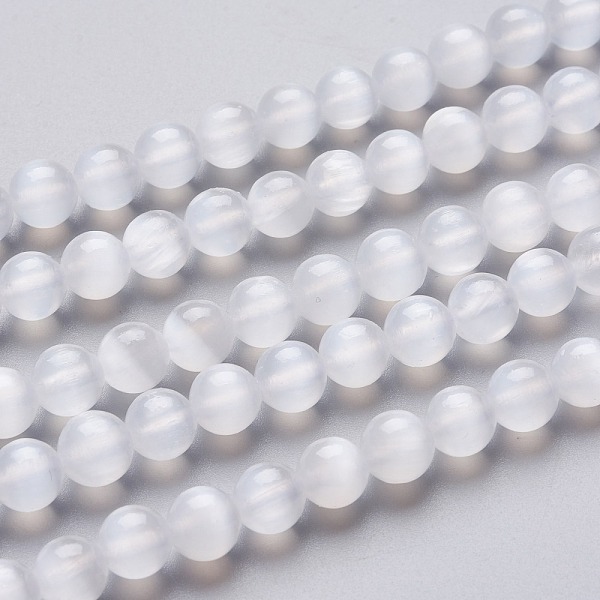 

PandaHall Natural Selenite Beads Strands, Round, 6~6.5mm, Hole: 0.9mm, about 64pcs/Strand, 15.55 inch(39.5cm) Selenite Round