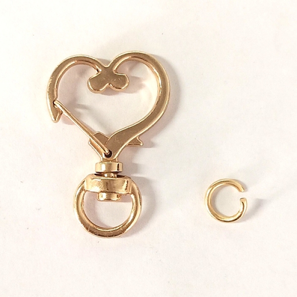 

PandaHall Heart Alloy Swivel Clasps, Lanyard Push Gate Snap Clasps, Light Gold, 3.5x2.4x0.6cm, Hole: 9x5mm Alloy