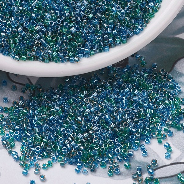 

PandaHall MIYUKI Delica Beads, Cylinder, Japanese Seed Beads, 11/0, (DB0985) Sparkling Lined Caribbean Mix(Blue Green) , 1.3x1.6mm, Hole..., Cyan