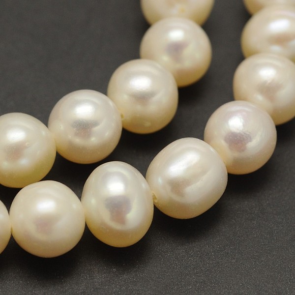 

PandaHall Natural Cultured Freshwater Pearl Beads Strands, Round, Beige, 6~6.5mm, Hole: 0.8mm, about 68pcs/strand, 15.5 inch Pearl Round..., Yellow