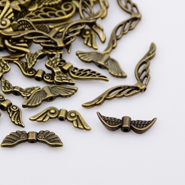 

PandaHall Tibetan Style Alloy Beads, Wing, Nickel Free, Antique Bronze, 12~43.5x3.5~17x3~4.5mm, Hole: 1~2mm Alloy Wing