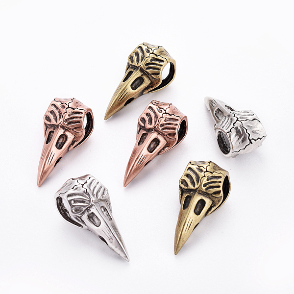 

PandaHall Brass Beads, Raven Skull, Mixed Color, 35x17x16.5mm, Hole: 4~8mm Brass Skull