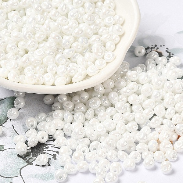 

PandaHall 6/0 Glass Seed Beads, Opaque Colours Luster, Teardrop, White, 4.5~5x4x3~3.5mm, Hole: 0.9mm, about 5625Pcs/Pound Glass Teardrop...