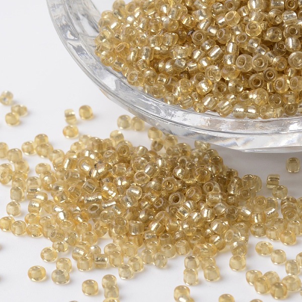 

PandaHall 12/0 Silver Lined Round Glass Seed Beads, Goldenrod, 2~3x1.5~2mm, Hole: 0.8~1mm, about 37500pcs/pound Glass Gold