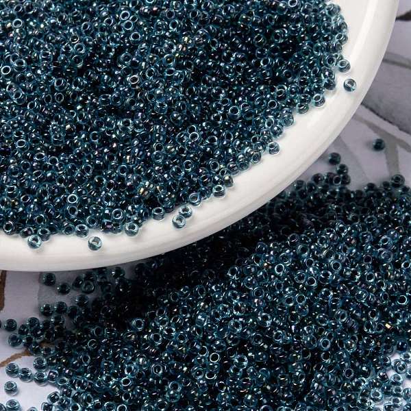 

PandaHall MIYUKI Round Rocailles Beads, Japanese Seed Beads, (RR347) Dark Blue Lined Aqua AB, 15/0, 1.5mm, Hole: 0.7mm, about 5555pcs/bottle...