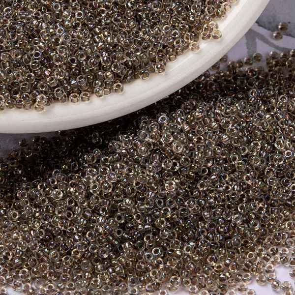

PandaHall MIYUKI Round Rocailles Beads, Japanese Seed Beads, (RR2195) Taupe Lined Crystal AB, 15/0, 1.5mm, Hole: 0.7mm, about 27777pcs/50g..., Brown