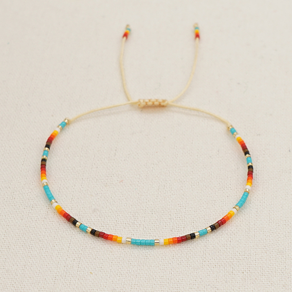 Bracciale intrecciato da donna con perline Heishi seed in vetro