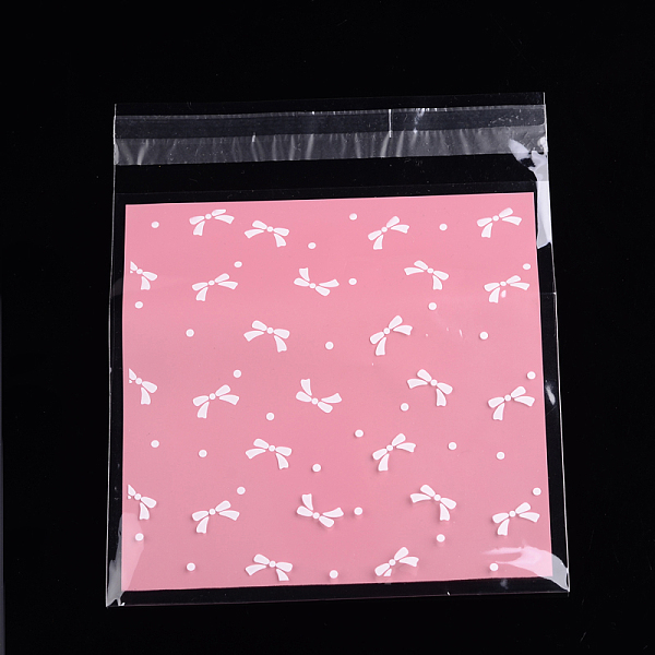 

PandaHall Rectangle OPP Cellophane Bags, with Bowknot Pattern, Pearl Pink, 17x14cm, Unilateral Thickness: 0.035mm, Inner Measure: 13.9x14cm...