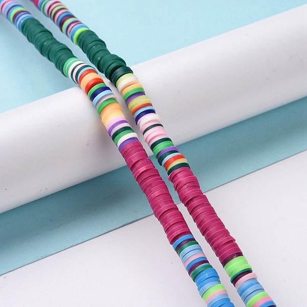 

PandaHall Handmade Polymer Clay Bead Strands, Heishi Beads, Disc/Flat Round, Camellia, 6x0.2~2mm, Hole: 2mm, about 325~330pcs/strand, 15.12~..., Pink