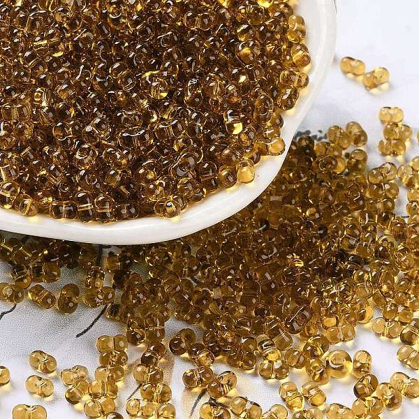 

PandaHall Glass Seed Beads, Transparent Colours, Silver Lined, Peanut, Dark Goldenrod, 4~4.5x2~2.5x2~2.5mm, Hole: 0.8~0.9mm, about...