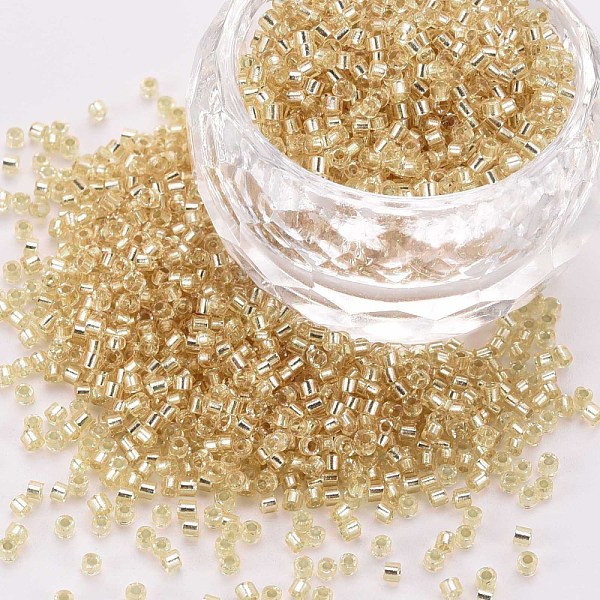 

PandaHall Glass Cylinder Beads, Seed Beads, Silver Lined, Round Hole, Light Khaki, 1.5~2x1~2mm, Hole: 0.8mm, about 80000pcs/bag, about...
