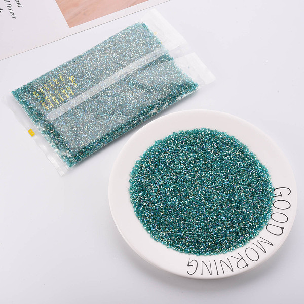 

PandaHall Glass Bugle Beads, Transparent Colours Rainbow, Light Sea Green, 2.5~3x2mm, Hole: 0.9mm, about 15000pcs/pound Glass