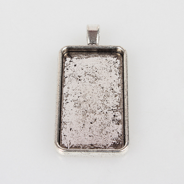 

PandaHall Vintage Tibetan Style Alloy Pendant Cabochon Settings, Cadmium Free & Lead Free, Plain Edge Bezel Cups, Antique Silver, Rectangle...
