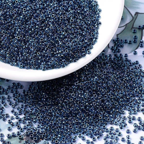 

PandaHall MIYUKI Round Rocailles Beads, Japanese Seed Beads, 11/0, (RR347) Dark Blue Lined Aqua AB, 2x1.3mm, Hole: 0.8mm, about 1111pcs/10g...