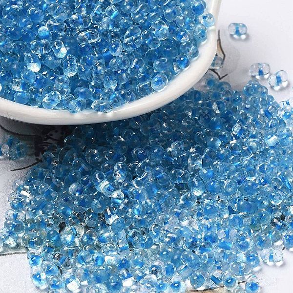 

PandaHall Glass Seed Beads, Peanut, Light Sky Blue, 3.5~4x2~2.5x2~2.3mm, Hole: 0.8mm, about 8000pcs/pound Glass Peanut