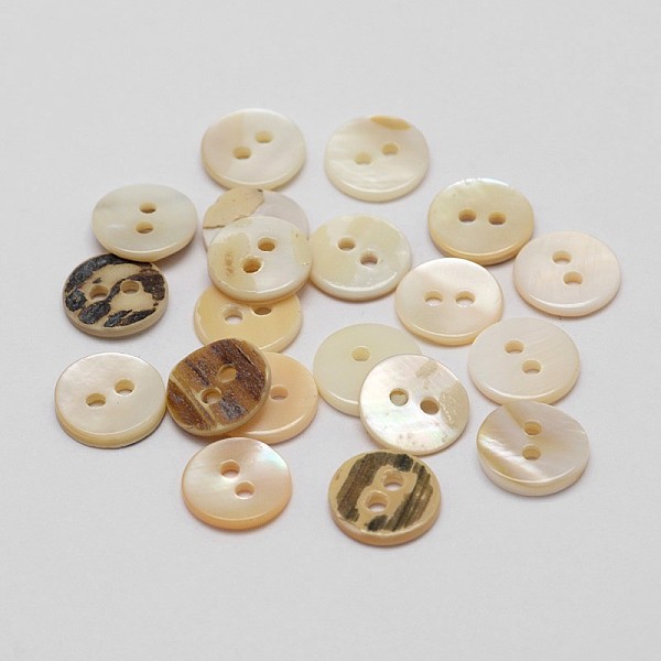 

PandaHall 2-Hole Shell Flat Round Buttons, Seashell Color, 10x2mm, Hole: 1.5mm, about 720pcs/bag Shell Flat Round