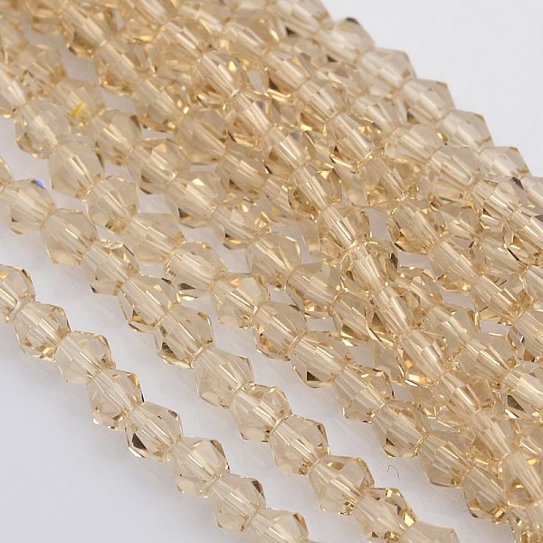 

PandaHall Bicone Glass Beads Strands, Faceted, PeachPuff, 3.5x3mm, Hole: 1mm, about 113~115pcs/strand, 36~36.5cm Glass Bicone Brown
