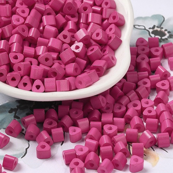 

PandaHall Baking Painted Glass Bead, Ceylon, Triangle Hole, Trangle, Hot Pink, 5x5x4mm, Hole: 1.3mm, 3150pcs/pound Glass Triangle