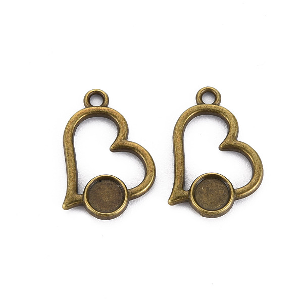 

PandaHall Tibetan Style Alloy Pendant Cabochon Settings, Cadmium Free & Lead Free, Hollow Heart, Antique Bronze, Tray: 5.5mm, 18x18x2mm...