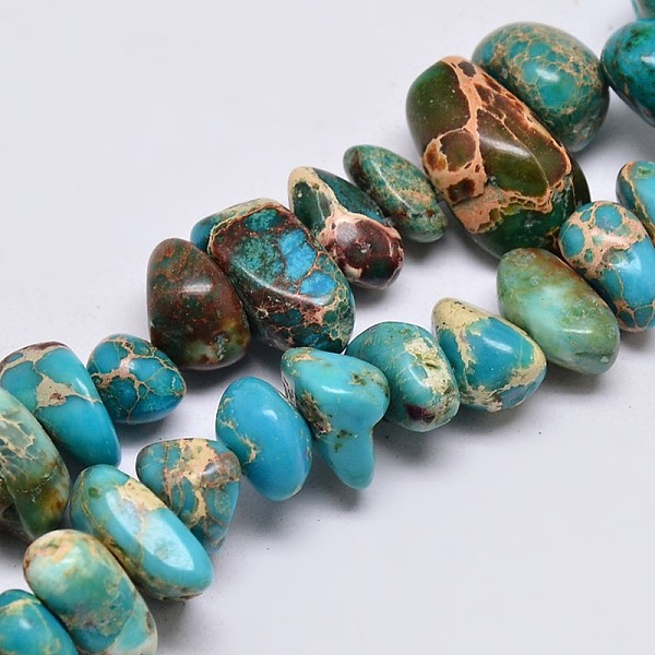 

PandaHall Natural Imperial Jasper Beads Strands, Nuggets, Dyed, Sky Blue, 8~16x4~10mm, Hole: 1mm, about 15.7 inch Imperial Jasper Nuggets...