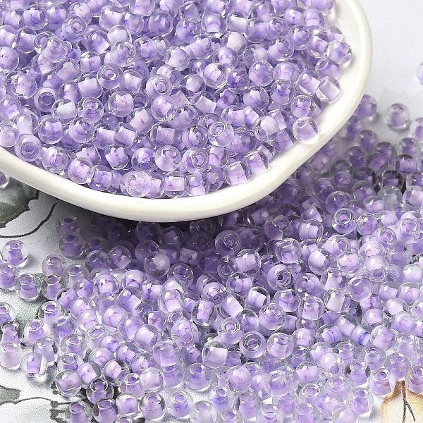 

PandaHall Transparent Glass Round Seed Beads, Inside Colours, Round, Lilac, 6/0, 4x3mm, Hole: 1.2mm, about 7258pcs/pound Glass Purple