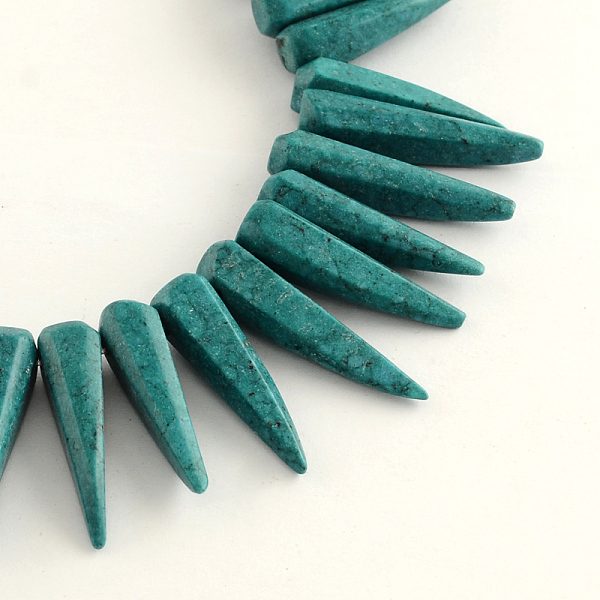 

PandaHall Dyed Synthetical Turquoise Bead Strands, Tusk Shape, Teal, 6~8x24~28mm, Hole: 2mm, about 62pcs/strand, 15.94 inch Synthetic..., Cyan
