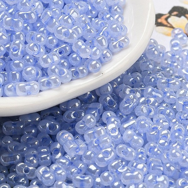 

PandaHall Ceylon Glass Seed Beads, Peanut, Cornflower Blue, 4~4.5x2~2.5x2~2.5mm, Hole: 0.8~0.9mm, about 10000pcs/pound Glass Peanut