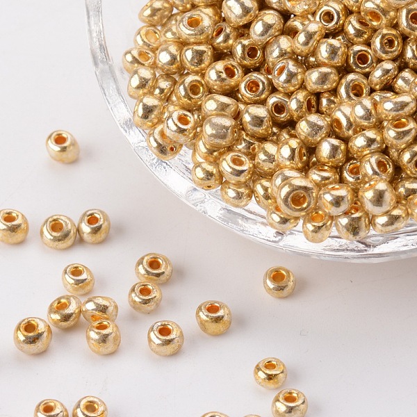 

PandaHall Electroplate Glass Seed Beads, Round Hole Rocailles, Gold Color, Size: about 3.5~5.5mm in diameter, 2.5~6.8mm thick, hole: 1mm...