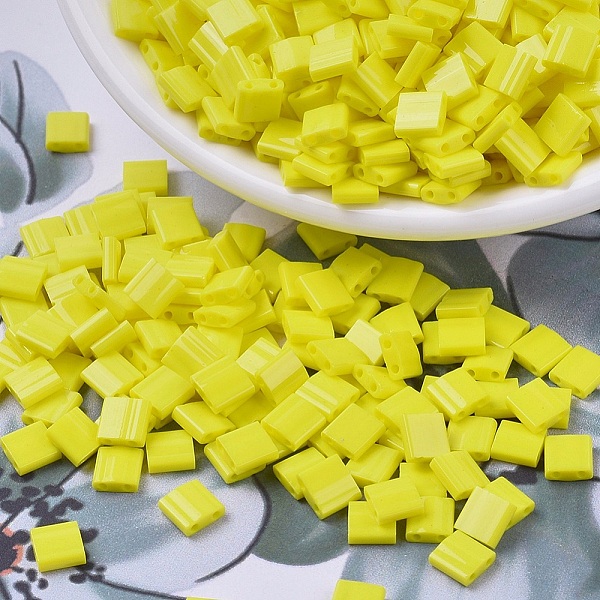 

PandaHall MIYUKI TILA Beads, Japanese Seed Beads, 2-Hole, (TL404) Opaque Yellow, 5x5x1.9mm, Hole: 0.8mm, about 590pcs/50g Glass Yellow