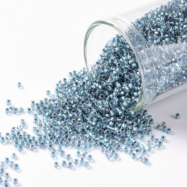

PandaHall TOHO Round Seed Beads, Japanese Seed Beads, (263) Inside Color AB Crystal/Light Capri, 15/0, 1.5mm, Hole: 0.7mm, about..., Cyan