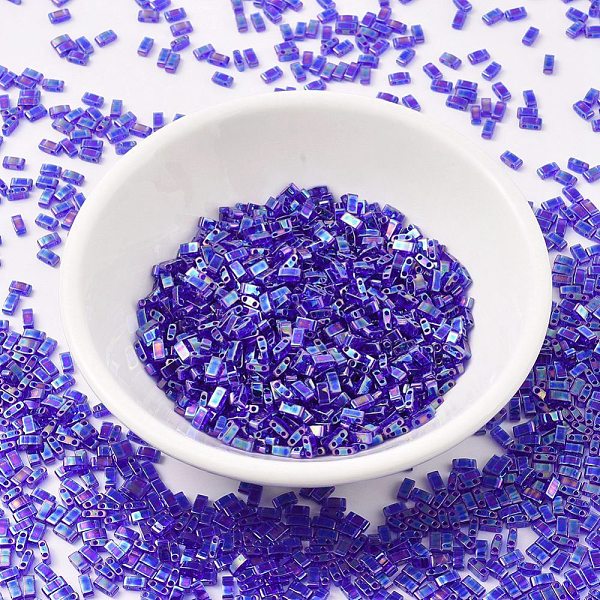 

PandaHall MIYUKI Half TILA Beads, Japanese Seed Beads, 2 Hole, (HTL177) Transparent Cobalt AB, 5x2.3x1.9mm, Hole: 0.8mm, about 1250pcs/50g..., Blue
