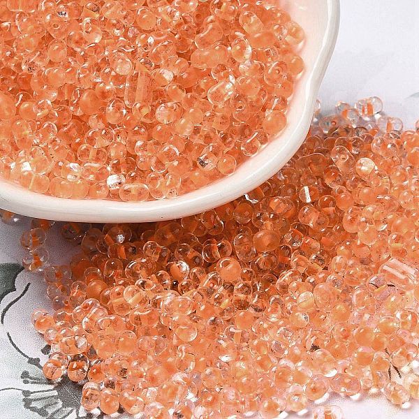 

PandaHall Glass Seed Beads, Peanut, Light Salmon, 3.5~4x2~2.5x2~2.3mm, Hole: 0.8mm, about 8000pcs/pound Glass Peanut