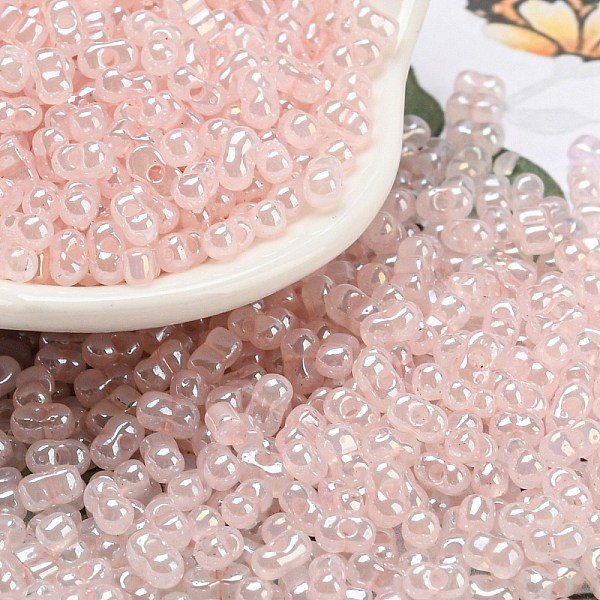 

PandaHall Ceylon Glass Seed Beads, Peanut, Lavender Blush, 4~4.5x2~2.5x2~2.5mm, Hole: 0.8~0.9mm, about 10000pcs/pound Glass Peanut