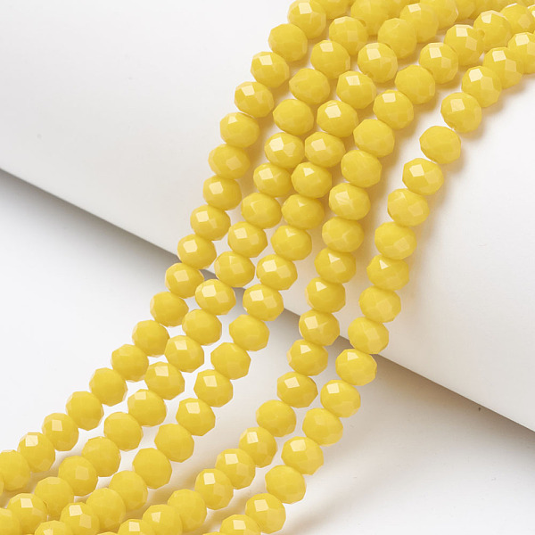

PandaHall Opaque Solid Color Glass Beads Strands, Faceted, Rondelle, Yellow, 4x3mm, Hole: 0.4mm, about 113~115pcs/strand, 41~42cm Glass...
