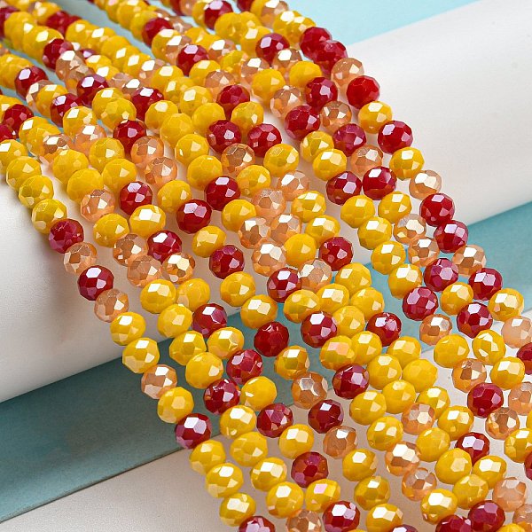 

PandaHall Glass Beads Strands, Faceted, Rondelle, Goldenrod, 4x3mm, Hole: 0.4mm, about 123~127pcs/strand, 15.75~16.5 inch(40~42cm) Glass..., Gold