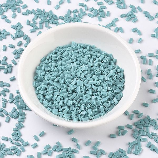 

PandaHall MIYUKI Half TILA Beads, Japanese Seed Beads, 2 Hole, (HTL412) Opaque Turquoise Green, 5x2.3x1.9mm, Hole: 0.8mm, about 250pcs/10g..., Cyan