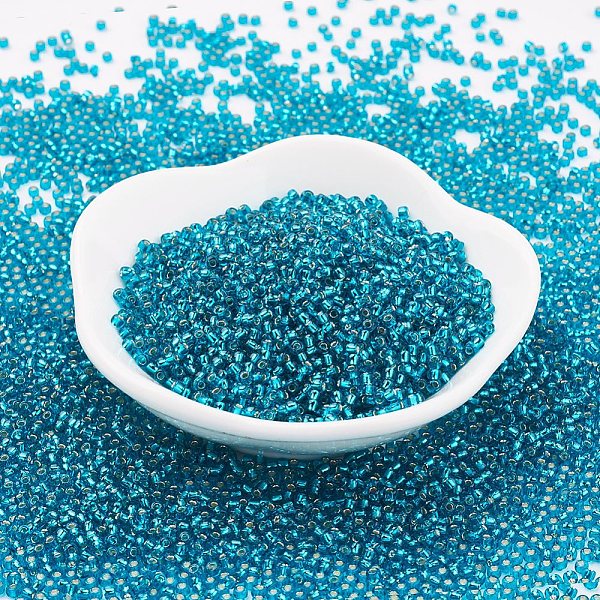 

PandaHall TOHO Japanese Seed Beads, Round, 11/0 , (23BDA) Green Aqua Silver Lined, 2x1.5mm, Hole: 0.5mm, about 42000pcs/pound Glass Green