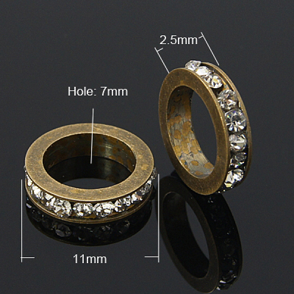 

PandaHall Brass Rhinestone Spacer Beads, Grade A, Antique Bronze Color, Flat Round, Crystal, 11x2.5mm, Hole: 8mm Brass+Rhinestone Flat Round..., Clear