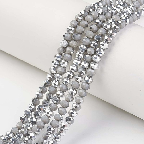 

PandaHall Electroplate Opaque Glass Beads Strands, Half Silver Plated, Faceted, Rondelle, Gray, 4x3mm, Hole: 0.4mm, about 113~115pcs/strand...