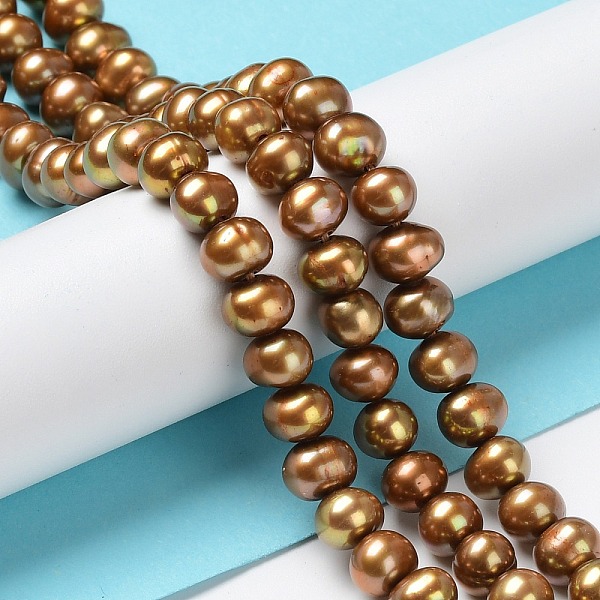

PandaHall Natural Pearl Dyed Beads Strands, Round, Dark Goldenrod, 6.5~7x5.5~6mm, Hole: 0.5mm, about 73~76pcs/strand, 15.94''~16.14''...