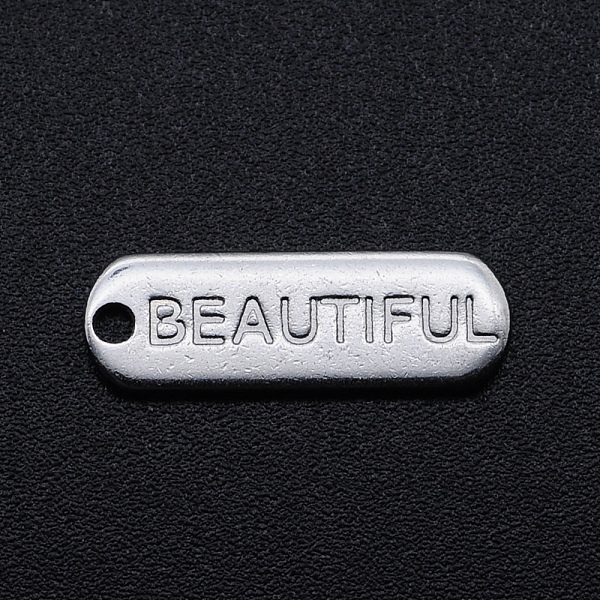 

PandaHall 201 Stainless Steel Pendants, Oval with Word BEAUTIFUL, Stainless Steel Color, 17.5x6x1mm, Hole: 1.2mm 201 Stainless Steel Oval