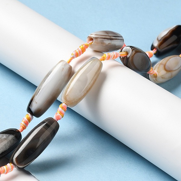 

PandaHall Natural Agate Beads Strands, Dyed & Heated, Rice, Black, 29.5~34x9.5~13.5mm, Hole: 2.5mm, about 10pcs/strand, 16''(41cm) Natural...