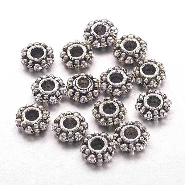 

PandaHall Tibetan Style Spacer Beads, Lead Free and Cadmium Free, Snowflake, for Christmas, Antique Silver, about 7mm in diameter, 2mm thick...