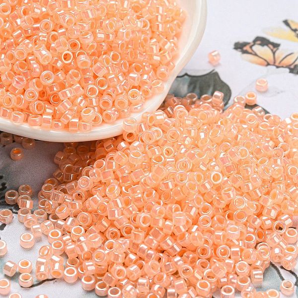 

PandaHall Electroplate Transparent Glass Seed Beads, Ceylon, Cylinder, PeachPuff, 2.5x1.6mm, Hole: 1.4mm, about 50398pcs/pound Glass Brown