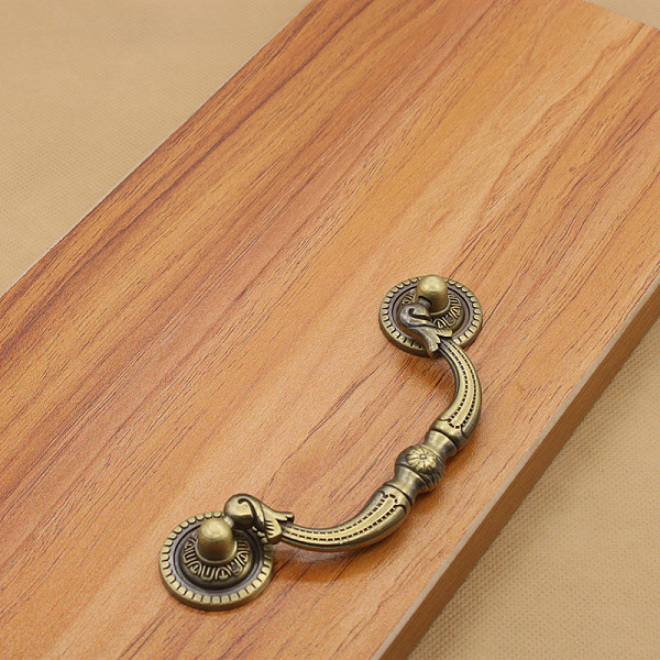 

PandaHall Embossed Alloy Drawer Bail Pulls, Retro Swing Dresser Handle, Cabinet Pulls Handles for Drawer, Doorknob Accessories, Antique...