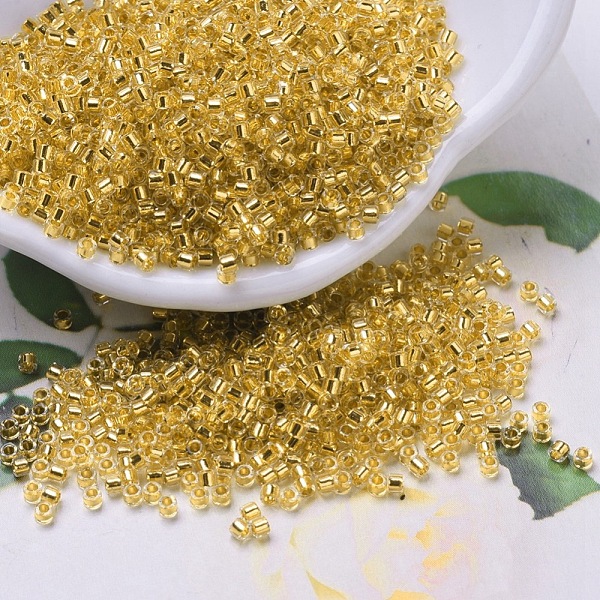 

PandaHall MIYUKI Delica Beads, Cylinder, Japanese Seed Beads, 11/0, (DB0033) Gold Lined Crystal, 1.3x1.6mm, Hole: 0.8mm, about 2000pcs/10g...