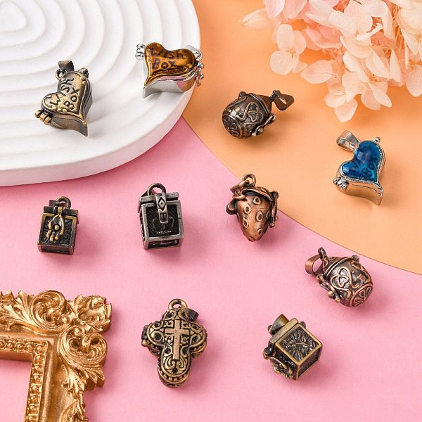 

PandaHall Brass Prayer Box Pendants, Mixed Shapes and Mixed Color, about 9~20mm wide, 14~28mm long, 10~20mm thick, hole: 1.5~5mm Brass Mixed..., Multicolor