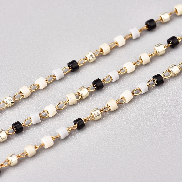 

PandaHall 3.28 Feet Handmade Glass Seed Beaded Chains, with Stainless Steel Cable Chains, Unwelded, Black, Golden, 1x0.9mm Glass Black